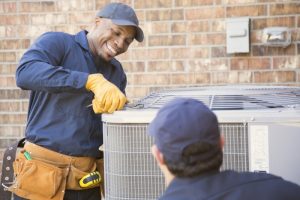 HVAC-technician-performing-repairs